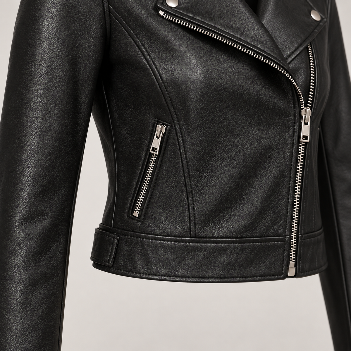 Monal Women's Black Cropped Leather Moto Jacket — pocket detail — AI-generated illustration